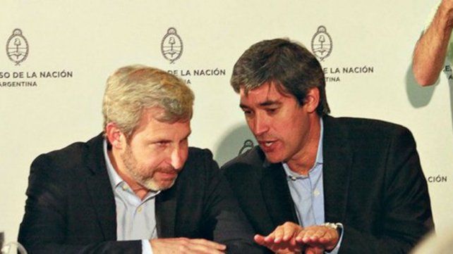 Frigerio y Adrián Pérez, funcionarios del gobierno nacional.